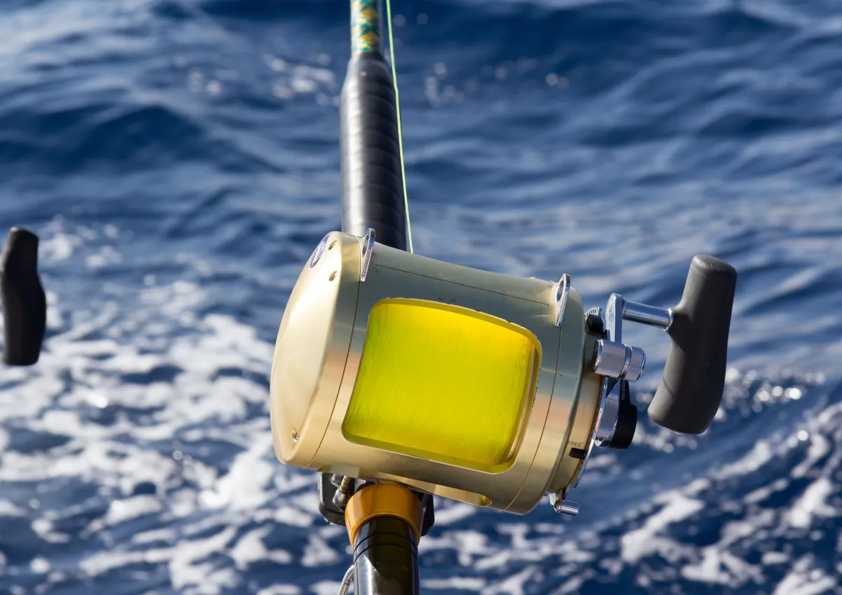 Close-up of a big game reel over the blue water